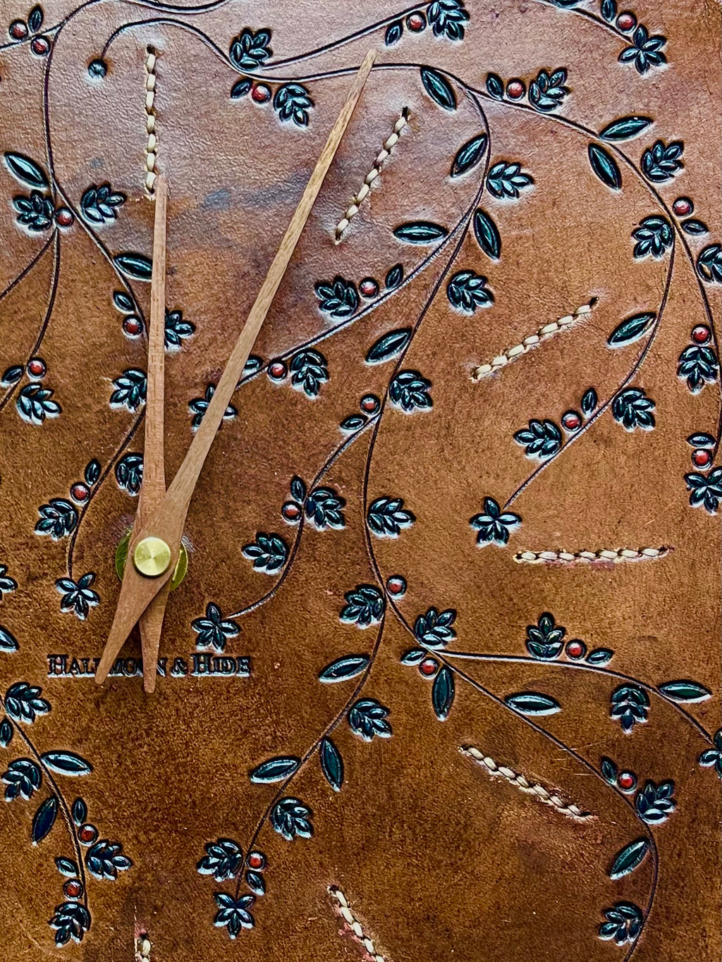 Hand Carved Leather Wall Clocks