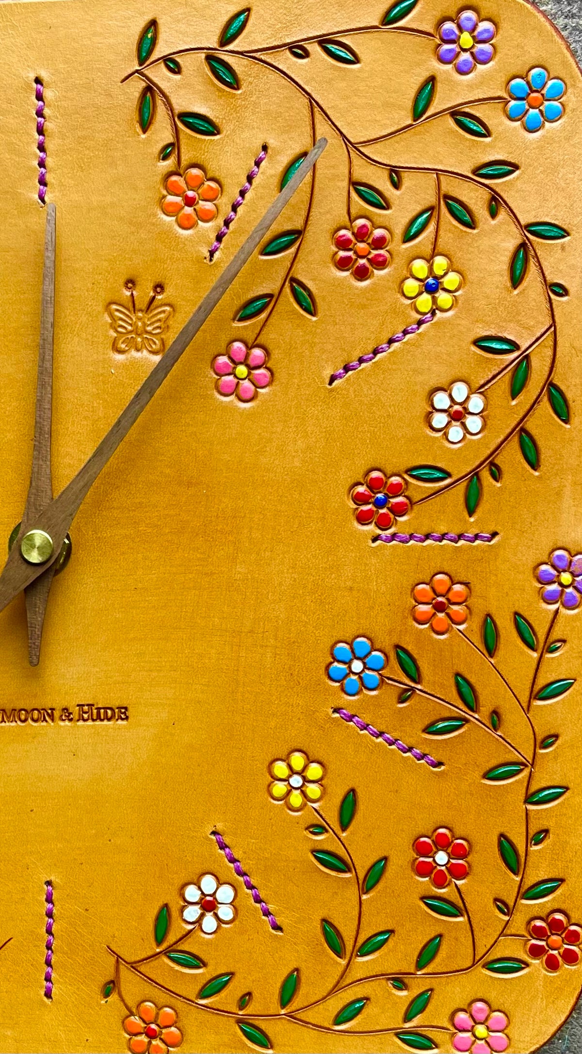 Hand Carved Leather Wall Clocks