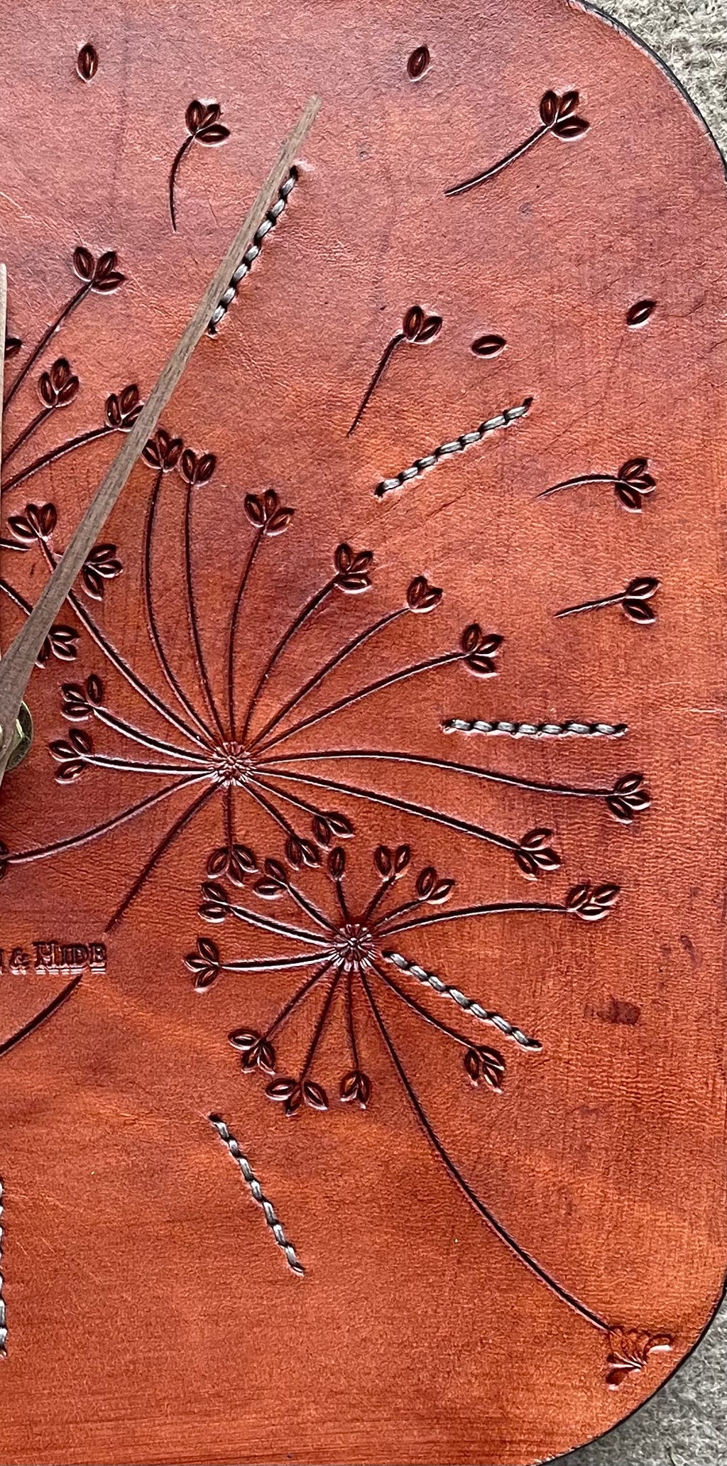 Hand Carved Leather Wall Clocks