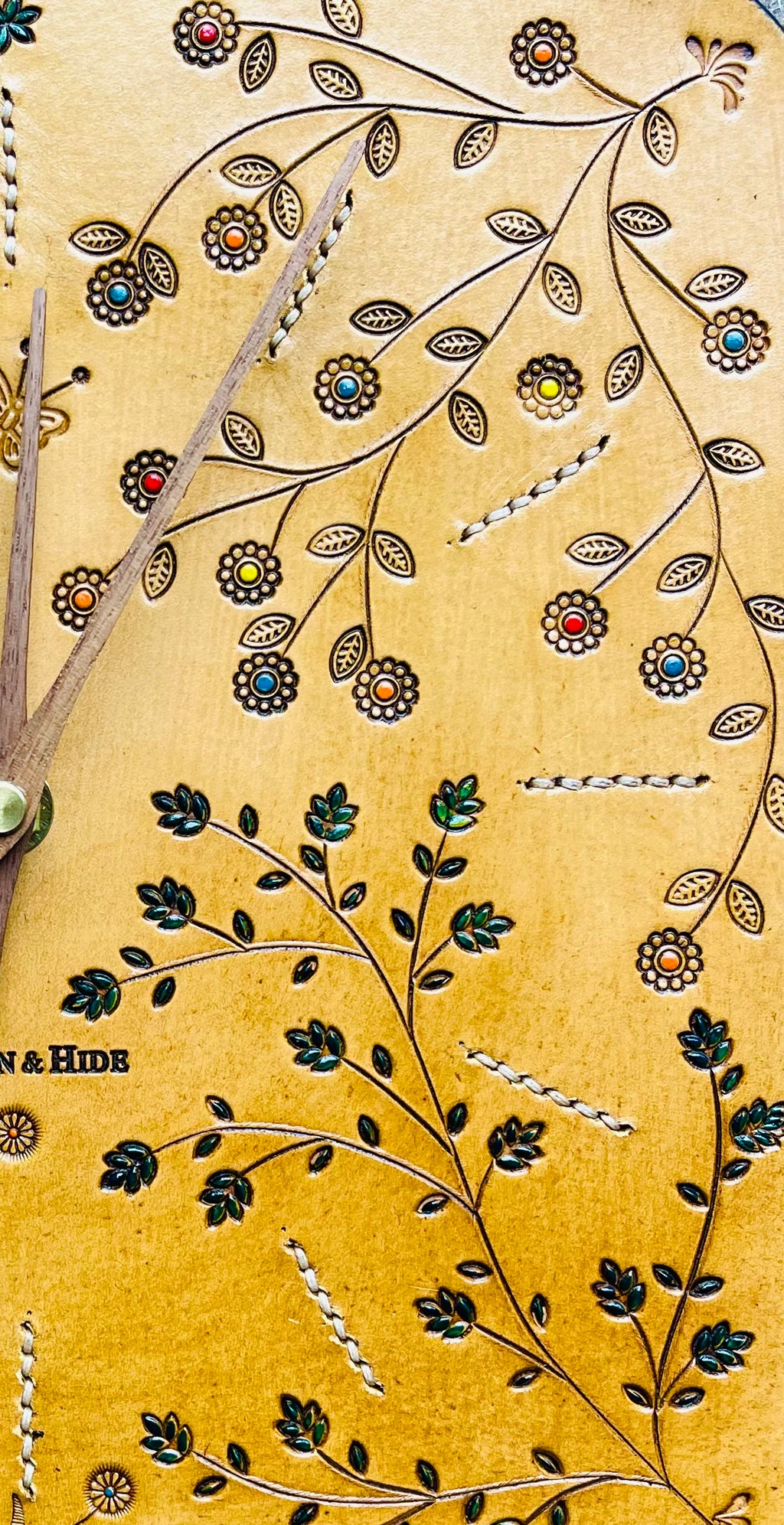 Hand Carved Leather Wall Clocks