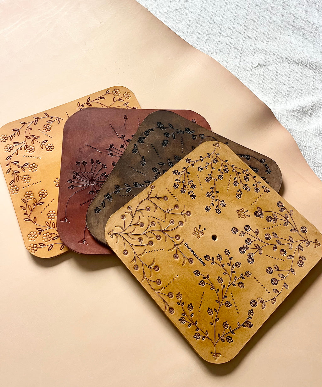 Hand Carved Leather Wall Clocks